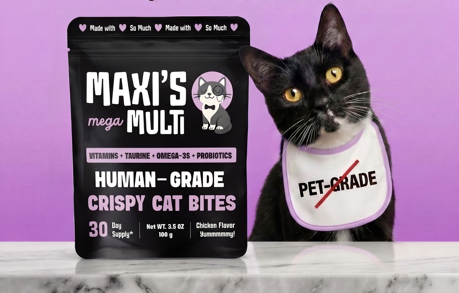 A tuxedo cat wearing a bib with PET-GRADE crossed out, next to a pouch of Maxi's mega Multi